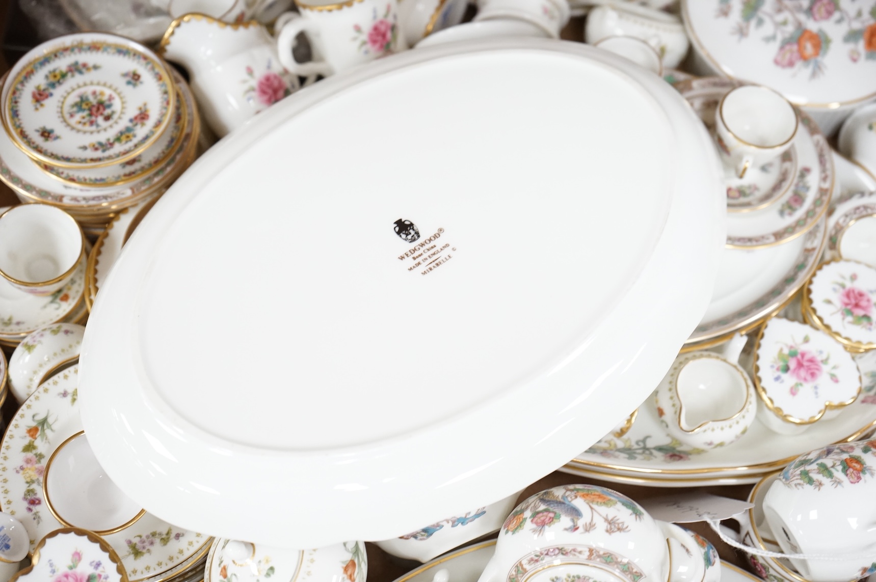 A large collection of Wedgwood and Coalport miniature tea wares, largest piece 24cm wide